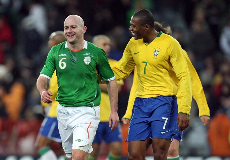 Lee Carsley shares a joke with Brazil's Julio Baptista after a friendly in Dublin in February 2008. Photograph: Morgan Treacy/Inpho
