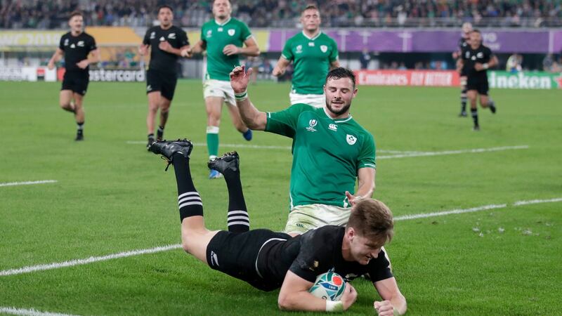 Robbie Henshaw can’t prevent Jordie Barrett scoring a late try for the All Blacks. Photograph: Jae C HongAP