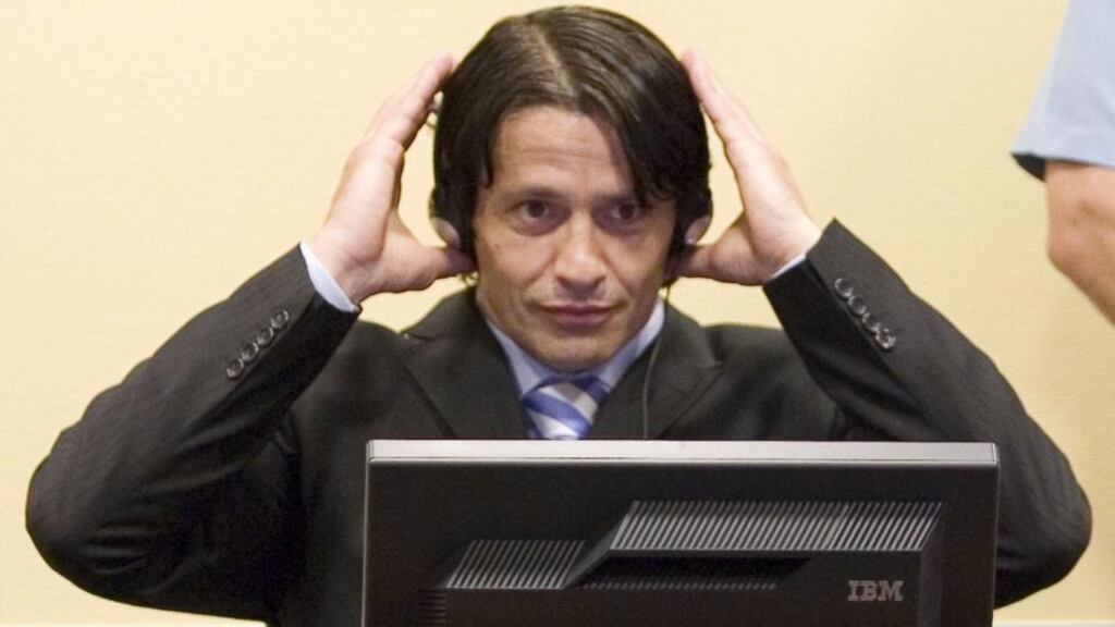 Former Bosnian Muslim commander Naser Oric prepares for his sentencing hearing at the UN war crimes tribunal in 2006 at The Hague. File photograph: Zoran Lesic-Pool/Getty Images