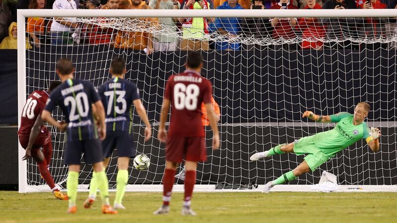 Sadio Mane scores Liverpool’s winner against Man City. Photograph: Adam hunger/Reuters