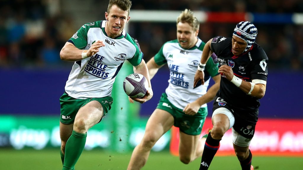 Connacht’s Matt Healy goes past Grenoble fullback Gio Aplon to score his side’s fourth try in a dramatic Challenge Cup quarter-final. photograph: James Crombie/Inpho