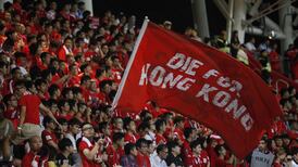 Hong Kong football fans risk Beijing's ire after booing anthem