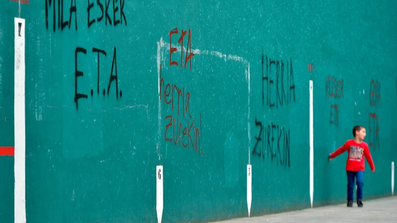 Graffiti reading “ETA, thanks a lot, the people with you”in Basque village of Hernani. Photograph: Ander Gillenea/AFP/Getty