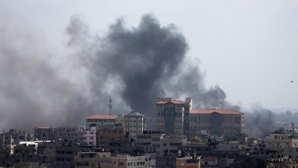 Smoke rises after an attack on Gaza City on Tuesday. Israel resumed air strikes on the Gaza Strip, six hours after it unilaterally accepted a truce but armed groups in Gaza continued firing rockets. Photograph: EPA