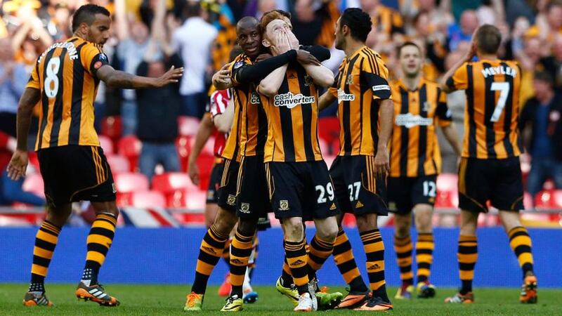 Hull City’s Stephen Quinn (centre) celebrates his goal with team-mates. Photograph: Darren Staples / Reuters