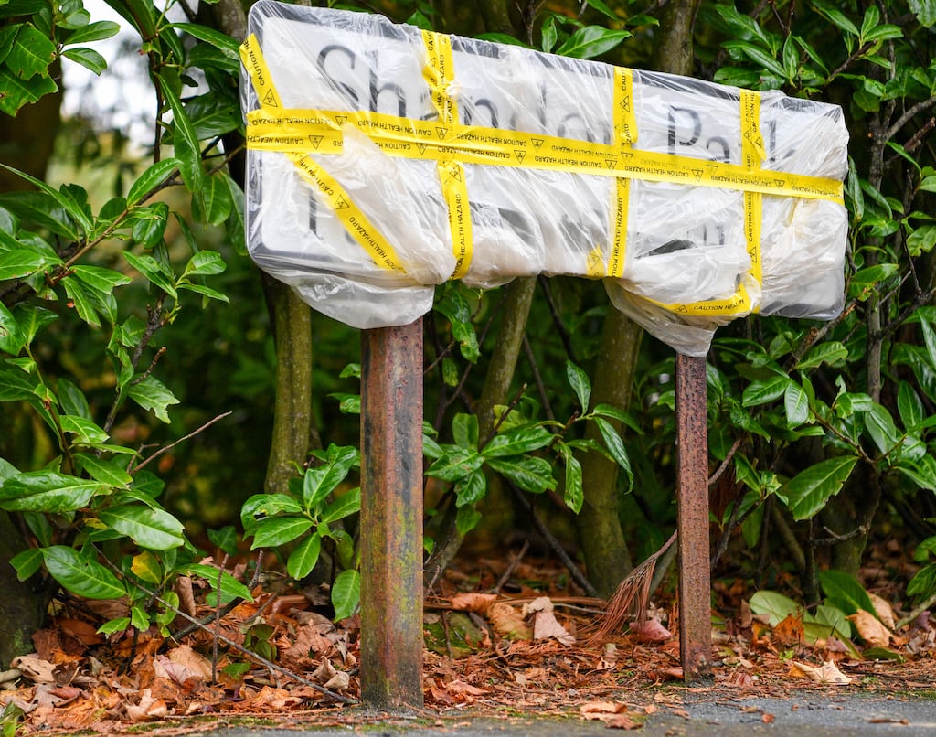 Criminal damage to an Irish-language street sign at Shandon Park, east Belfast. Photograph: Andrew McCarroll/Pacemaker Press