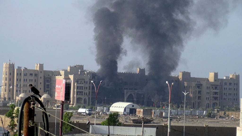The Al Qasr hotel after it was hit by rockets in Aden, Yemen. Photograph: Stringer/Reuters