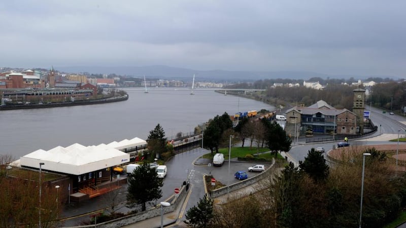 View showing the present Waterside Railway Station (on left with its distinctive roof) and the unique 19th century Old Waterside Railway Station (right of picture) with distinctive clock. Photograph: Trevor McBride
