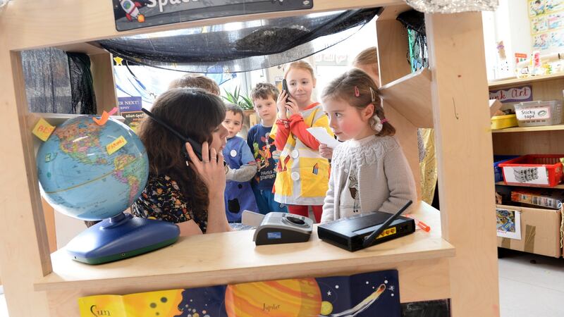 Sorcha Brennan, teacher at Glasnevin Educate Together, at play with junior infants. Photograph: Dara Mac Dónaill