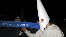 Finnish demonstrators throw missiles at bus full of asylum seekers