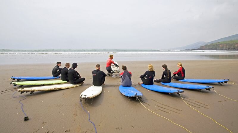 Surfing on Inch Beach. Photograph: Tadgh Hayes