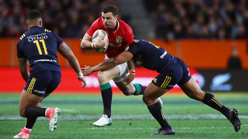 Robbie Henshaw of the Lions is tackled by Malakai Fekitoa of the Highlanders in Dunedin. Photograph: David Rogers/Getty Images