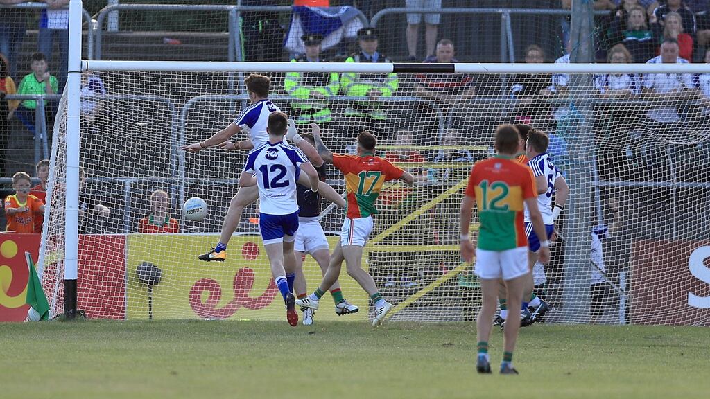 Fintan Kelly scores Monaghan’s goal against Carlow in the All-Ireland SFC qualifier clash at Netwatch Dr Cullen Park, Carlow. Photograph: Donall Farmer/Inpho