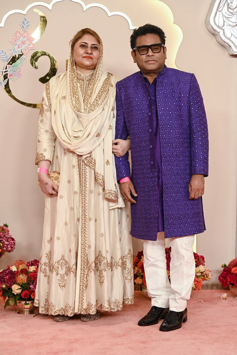 Ambani wedding: Indian music composer and singer AR Rahman with his wife Saira Banu. Photograph: Sujit Jaiswal/AFP vi Getty Images