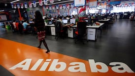 Alibaba shares hit high after market valuation beats Walmart
