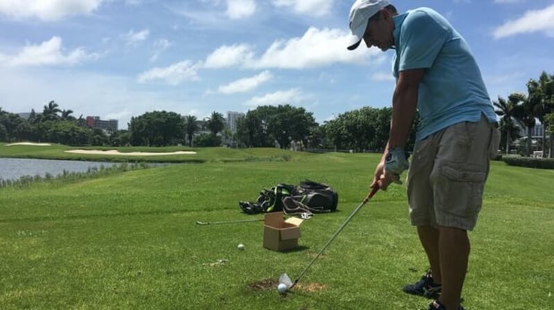 Max Borges practises on Miami Beach golf course. Photograph: Ed Pilkington/ Guardian