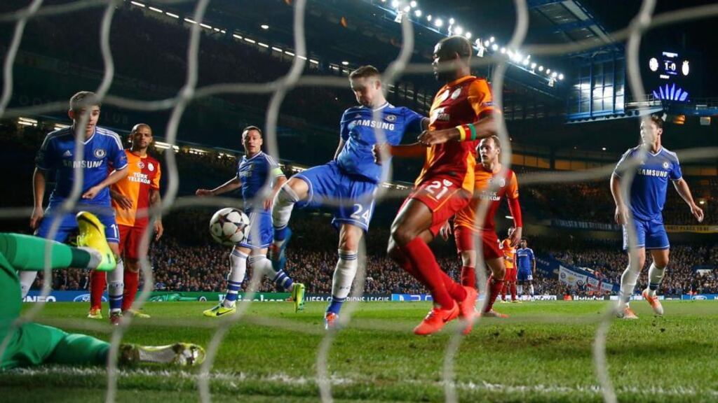 Chelsea’s Gary Cahill (centre left) shoots to score the second against Galatasaray at Stamford Bridge. Photograph: Eddie Keogh/Reuters