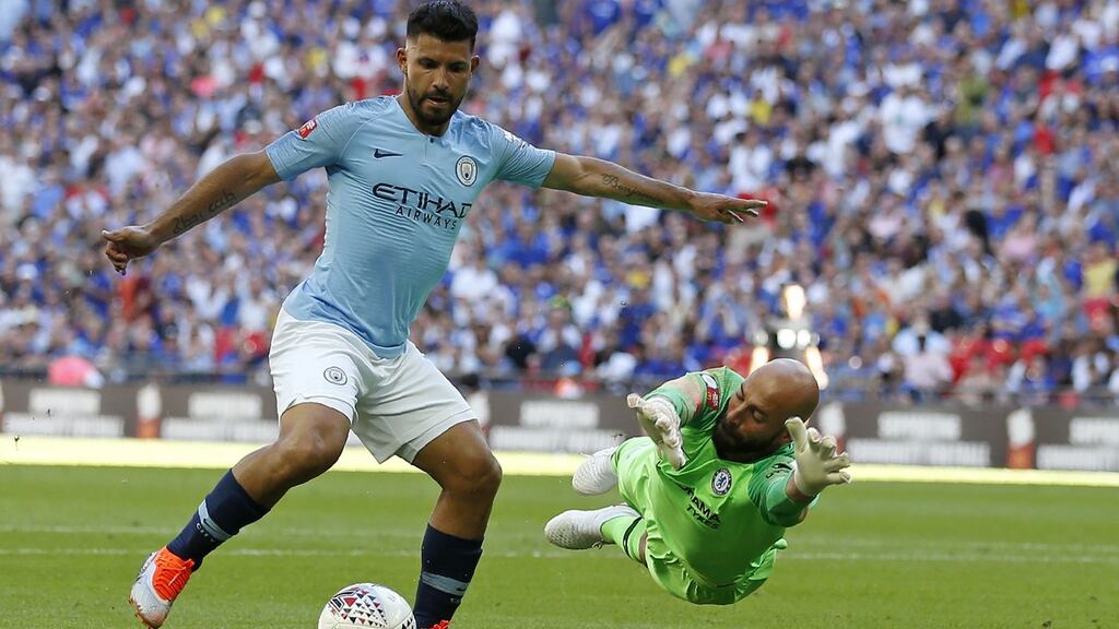 Manchester City’s Argentinian striker Sergio Agüero goes around Chelsea’s Argentinian goalkeeper Willy Caballero but puts his shot wide during the Community Shield friendly at Wembley Stadium. Photograph: Ian Kington/AFP/Getty Images