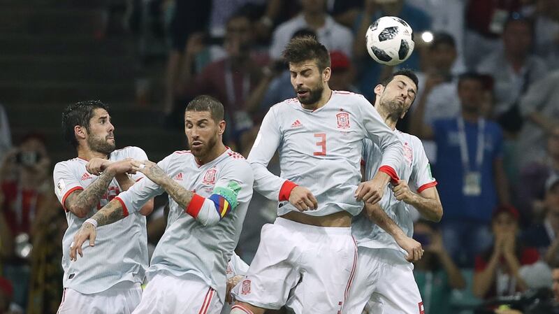 The Spanish wall fail to stop a Cristiano Ronaldo free-kick. Photograph: Odd Andersen/AFP/Getty