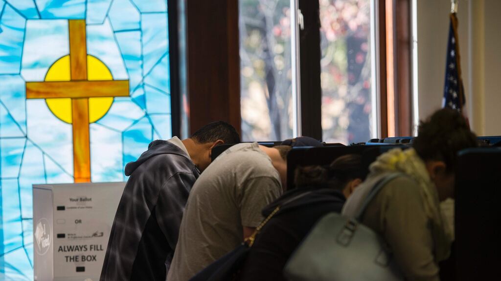 People vote at a polling station in a church in Fairfax, Virginia during the US presidential election on November 8th, 2016. Photograph: Andrew Caballero-Reynolds/AFP/Getty Images