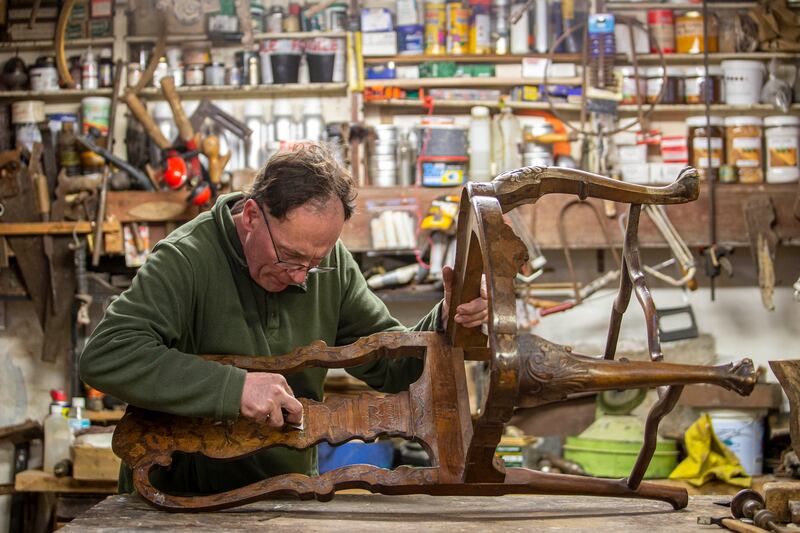 Antique furniture restorer George Williams at work