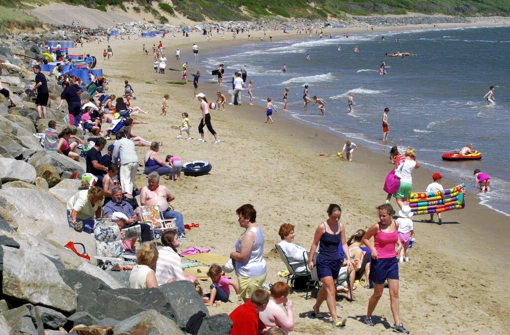 Holidaymakers enjoying the sunshine on Courtown Beach, Co Wexford. Photograph: Pat Langan