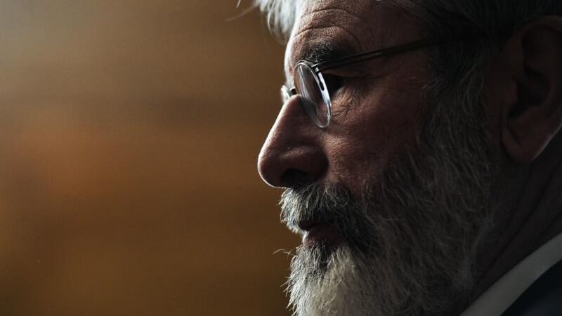 Divisive: to his supporters Gerry Adams has devoted himselft to removing the gun from Irish life. To his opponents he is a man who attempts to distort history. Photograph: Charles McQuillan/Getty