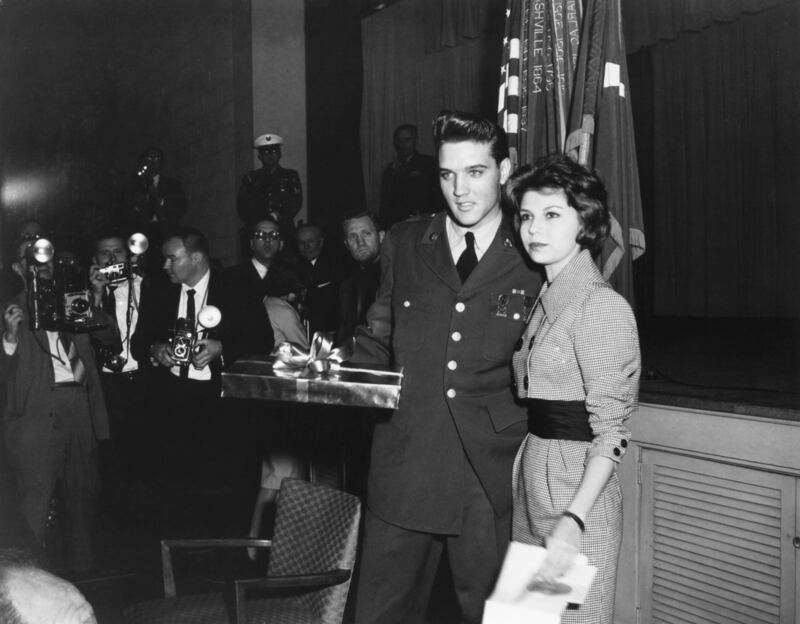 Nancy Sinatra with Elvis Presley on his last day in military service, March 1960. Photograph: Corbis/Getty Images
