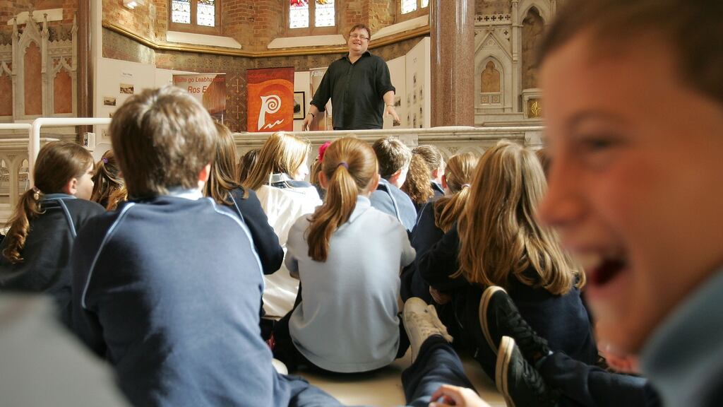 Read from the altar: Derek Landy speaks to students from Rush National School. His books have been put on the naughty list. Photograph: Alan Betson