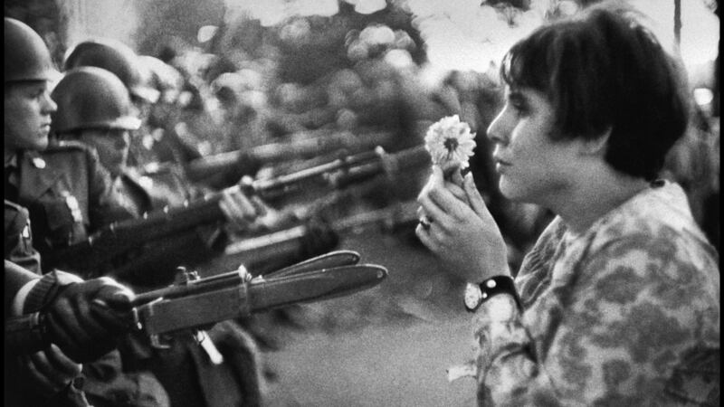 Marc Riboud’s famous photograph of Jan Rose Kasmir during the 1967 march on the Pentagon, which helped turn US public opinion against the Vietnam War. Photograph: Marc Riboud/Magnum Photos