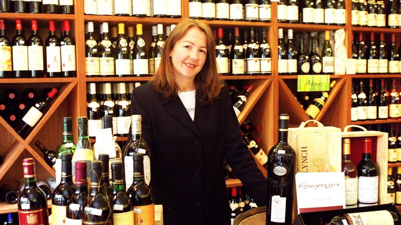 Pamela Cooney in On the Grapevine in Dalkey: celebrating 18 years in business, the shop is offering  18 wines at the price they were selling for when they first opened on April 1st, 1999. Photograph: Cyril Byrne