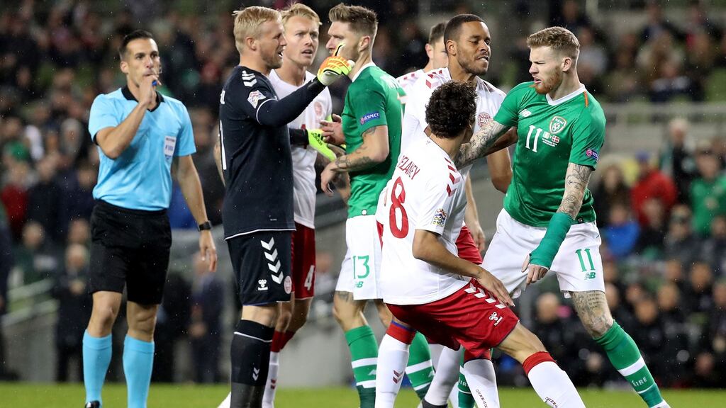 James McClean clashes with Denmark’s Mathias Jorgensen and Thomas Delaney during the Nations League match at the Aviva stadium. Photograph: Bryan Keane/Inpho