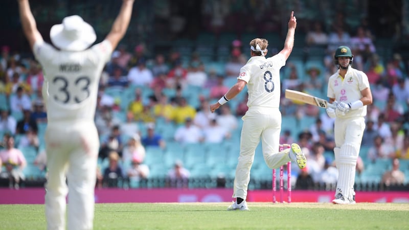 Stuart Broad celebrates taking the wicket of Pat Cummins in Sydney. Photograph: Dean Lewins/EPA