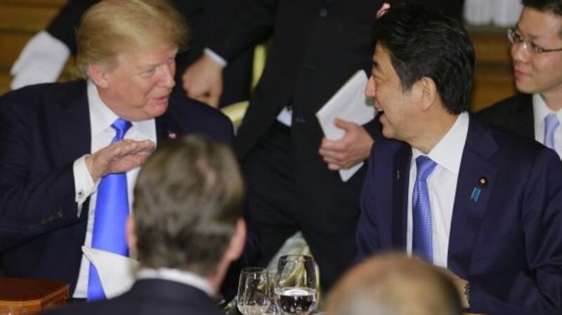 US president Donald Trump with Shinzo Abe, Japan’s prime minister. Photograph: Shizuo Kambayashi/Bloomberg