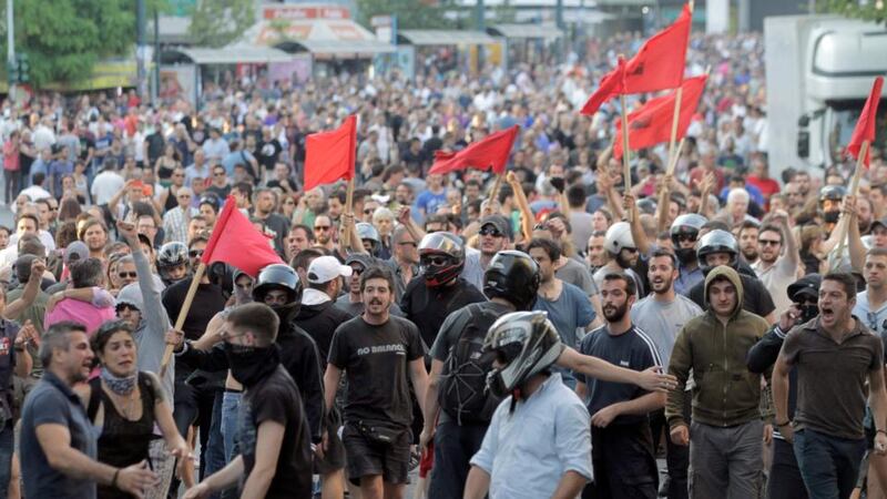 Minor incidents occurred between protesters and the police during a “No” side rally near Syntagma Square, outside the Greek parliament in Athens. Photograph: Orestis Panagiotou/EPA