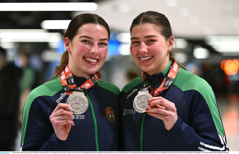Aoife and Lisa O'Rourke with the silver medals they won in their respective Elite Women 70-75kg middleweight and 66-70kg light middleweight final bouts at the 2025 Women's World Boxing Championships finals. Photograph: Ray McManus/ Sportsfile