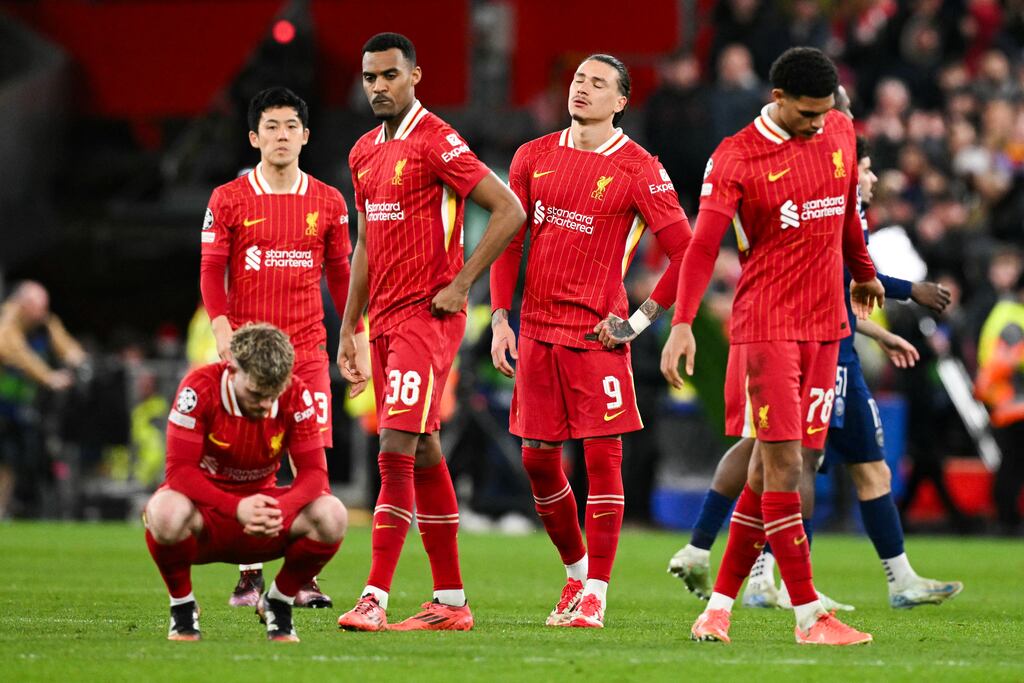 Liverpool players react after their loss to PSG on penalties on Tuesday night. Photograph: Oli Scarff/AFP via Getty Images