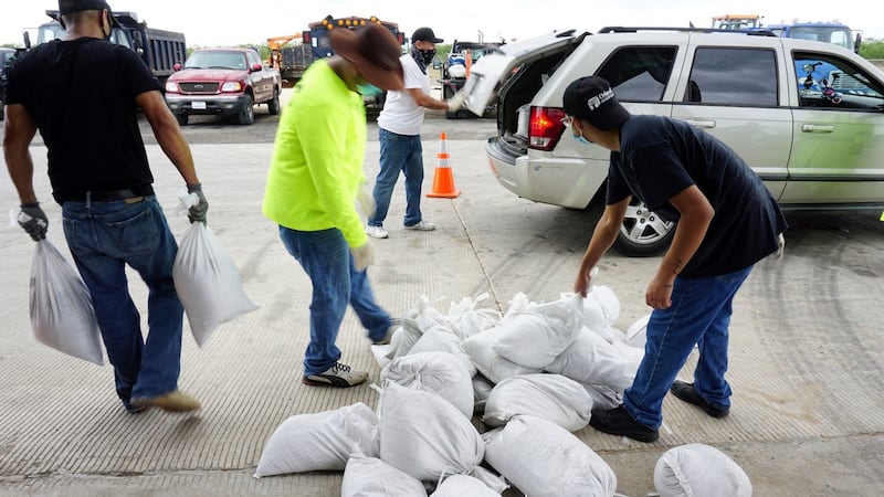 Sandbags are distributed in Brownsville, Texas as residents prepare for torrential rainfall due to Hurricane Hanna. Photograph: AP