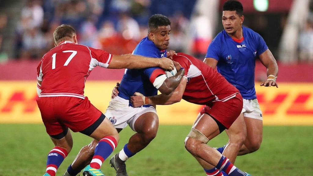 Samoa’s Rey Lee-Lo is tackled by Bogdan Fedotko and Andrei Polivalov of Russia in Samoa’s 34-9 win in the Rugby World Cup in Kumagaya, Saitama, Japan. Photograph: Cameron Spencer/Getty Images
