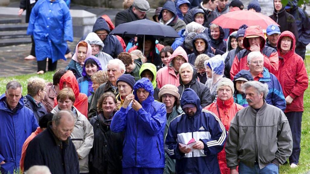 People line up to pray at a pilgrimage at Lough Derg, Co. Donegal. File Photograph: Eric Luke/The Irish Times