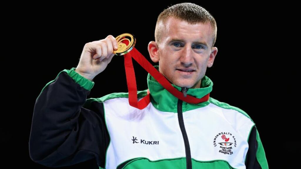 Gold medalist Paddy Barnes of Northern Ireland poses during the medal ceremony for the Men’s Light Fly (49kg) Final in Glasgow. Photograph: Alex Livesey/Getty Images