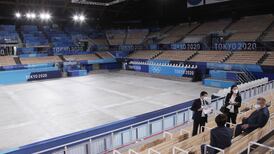 Clap, don’t cheer and no high-fives, Olympic spectators told