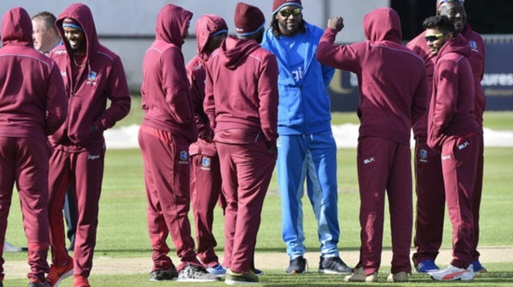 Chris Gayle with his West Indies teammates ahead of the washout in Belfast. Photograph: Rowland White/Inpho