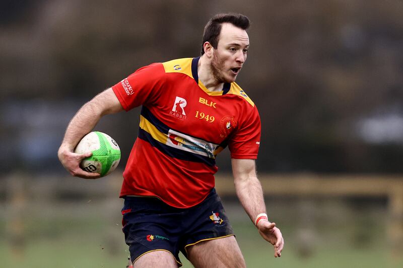 Joel McBride went over for Ballyclare's winning score against Monkstown. Photograph: Ben Brady/Inpho