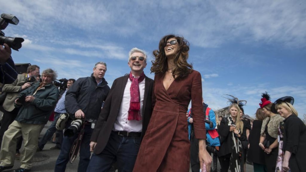 Glenda Gilson with Louis Walsh at the Punchestown racing festival. The judge said she had displayed “a want of proper standards” in effectively not taking any interest in the affairs of the company of which she was a director. File photograph: Brenda Fitzsimons/The Irish Times