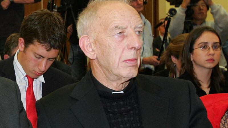 Vital intermediary: Fr Alex Reid. Photograph: Fran Caffrey/AFP/Getty Images