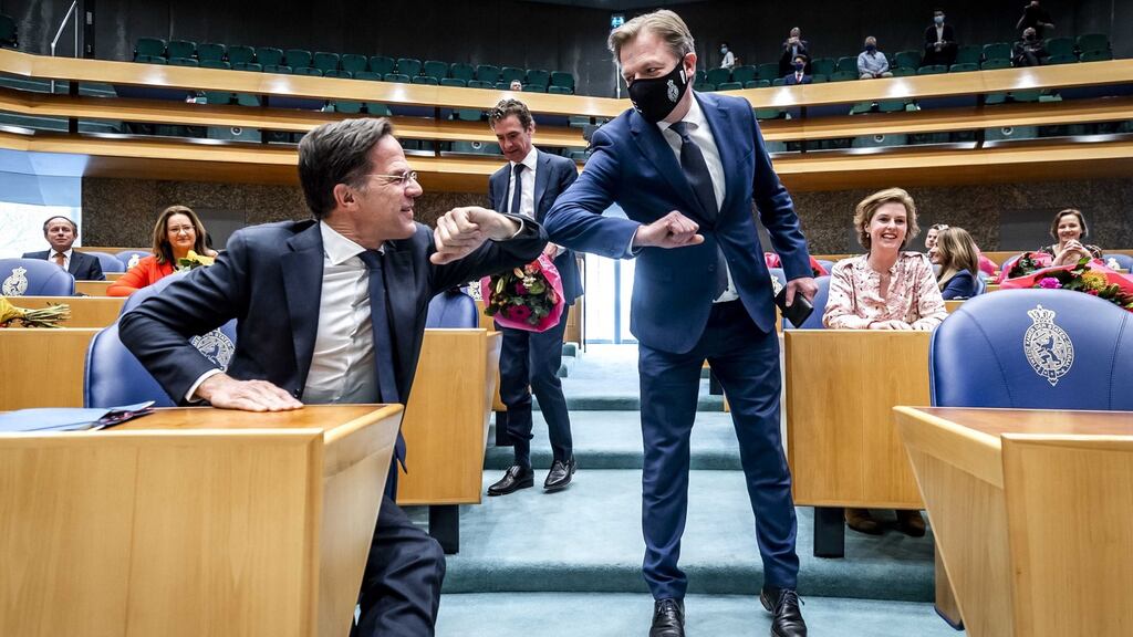 Dutch caretaker prime minister Mark Rutte (left) greets Pieter Omtzigt  prior to the swearing-in of the members of the House of Representatives, in The Hague, the Netherlands, on Wednesday. Photograph: Remko de Waal/ EPA