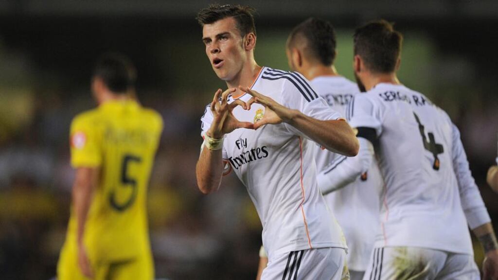 Gareth Bale of Real Madrid celebrates scoring the opening goal on his debut during the La Liga match against Villarreal at El Madrigal. Photograph: Denis Doyle/Getty Images