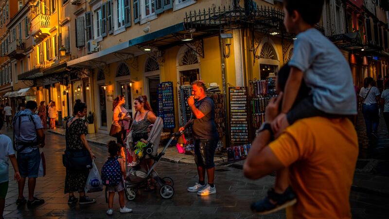 An alley in the old town of Corfu. Corfu town has become in effect a museum and a vast souvenir shop. Photograph: Angelos Tzortzinis/AFP via Getty Images