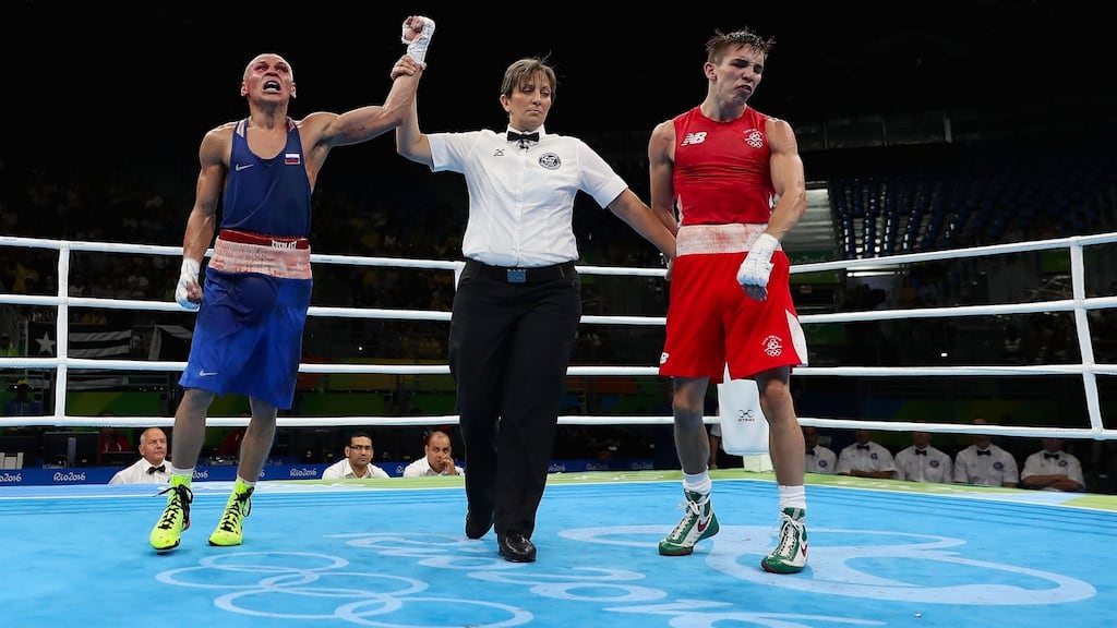 Boxer Michael Conlan (right) shows his disgust as Vladimir Nikitin of Russia is declared the winner in their  bantamweight  quarter-final in  Rio. Photograph:  Christian Petersen/Getty Images
